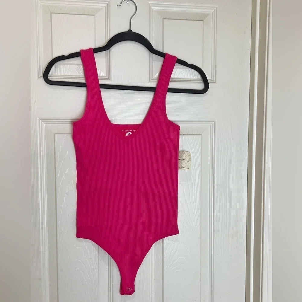 FREE PEOPLE XyZ ribbed pink recycled bodysuit size M/L